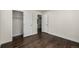 Bright bedroom with hardwood floors and two closets at 1770 Akron St, Aurora, CO 80010