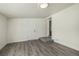 Bright Gathering room with hardwood floors and exterior access at 1770 Akron St, Aurora, CO 80010