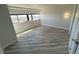 Bright bedroom with updated flooring and expansive windows offering lots of natural light at 100 Park Ave # 1405, Denver, CO 80205