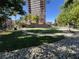 A well-maintained dog park with lush green grass, offering a perfect space for pets to play at 100 Park Ave # 1405, Denver, CO 80205