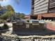 Outdoor pool area with grill and outdoor kitchen for entertaining residents and their guests at 100 Park Ave # 1405, Denver, CO 80205