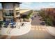 Vibrant community plaza with outdoor seating, mature trees, and inviting pedestrian walkways at 3353 N Catawba Way, Aurora, CO 80019