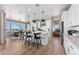 Modern kitchen featuring stainless steel appliances and large breakfast bar at 3353 N Catawba Way, Aurora, CO 80019