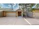 Home with stone and wood exterior and front yard landscaping at 867 Hill And Dale Rd # B, Golden, CO 80401