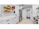 Modern kitchen featuring white cabinets, stainless steel appliances, and a stylish countertop at 867 Hill And Dale Rd # B, Golden, CO 80401