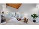 Inviting living room with vaulted wood ceilings, fireplace, and a walk-out balcony at 867 Hill And Dale Rd # B, Golden, CO 80401