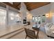 Open floor plan living room with fireplace and views of the dining area and balcony at 867 Hill And Dale Rd # B, Golden, CO 80401