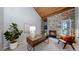 Cozy office space with a stone fireplace, modern desk, and natural light at 867 Hill And Dale Rd # B, Golden, CO 80401