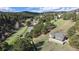Community entrance sign along a winding road at 867 Hill And Dale Rd # B, Golden, CO 80401