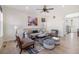 Bright and stylish living room with neutral walls, comfortable furniture, and light wood floors at 1953 Morgan Dr, Erie, CO 80516