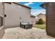Backyard featuring a hot tub, a well-maintained lawn, and low-maintenance landscaping, perfect for outdoor enjoyment at 6619 Mariposa Ct, Denver, CO 80221