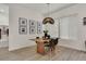 Dining room with a stylish light fixture and modern decor at 6619 Mariposa Ct, Denver, CO 80221
