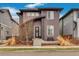 Charming two-story home featuring a modern design with beautiful curb appeal and inviting entryway at 6619 Mariposa Ct, Denver, CO 80221