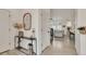 Inviting hallway with elegant decor and a glimpse into the bright living area at 6619 Mariposa Ct, Denver, CO 80221