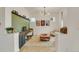 Modern home office with built-in desk, contemporary lighting, and neutral decor, perfect for remote work at 6619 Mariposa Ct, Denver, CO 80221