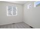 Cozy bedroom featuring a carpeted floor and a bright window view at 46549 Avery Ln, Bennett, CO 80102