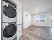 Conveniently located laundry area near a large living space at 46549 Avery Ln, Bennett, CO 80102
