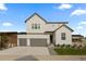 Beautiful modern farmhouse with a three-car garage and eye-catching curb appeal at 4739 Gray Wolf Ln, Castle Rock, CO 80104