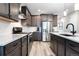 Stylish kitchen with modern appliances, sleek countertops, and ample cabinet space at 4739 Gray Wolf Ln, Castle Rock, CO 80104