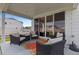 Covered patio with comfortable seating and an outdoor rug, perfect for relaxation at 4739 Gray Wolf Ln, Castle Rock, CO 80104