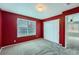 Red bedroom with closet and a big window with natural light at 22162 E Alamo Ln, Centennial, CO 80015