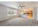 Spacious living room open to the kitchen area with lots of natural light at 22162 E Alamo Ln, Centennial, CO 80015