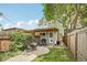 Inviting backyard featuring a patio area, lush greenery, perfect for outdoor entertaining at 4165 Winona Ct, Denver, CO 80212