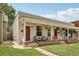 Street view of a quaint duplex with well-maintained lawns and inviting front porches at 4165 Winona Ct, Denver, CO 80212