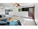 This bedroom has mirrored closet doors and exterior access at 5197 S Perry St, Littleton, CO 80123