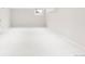 Unfinished basement with white walls and carpet, offering a blank canvas for customization at 620 Clermont St, Denver, CO 80220