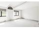 Bright, open bedroom with modern windows and neutral decor for a serene atmosphere at 620 Clermont St, Denver, CO 80220