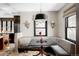 Cozy breakfast nook with booth seating, stylish lighting, and unique decor at 620 Clermont St, Denver, CO 80220