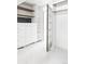 Well-organized closet with shelving, drawers, and ample storage space, with natural light at 620 Clermont St, Denver, CO 80220
