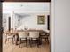 Formal dining room with hardwood floors, chandelier, and staircase views at 620 Clermont St, Denver, CO 80220