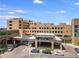 Exterior daytime view of Rose Medical Center with patient drop-off, emergency entrance, and parking area at 620 Clermont St, Denver, CO 80220