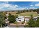Charming two-story home with detached garage and view of the green space from the aerial view at 6502 W 96Th Ave, Westminster, CO 80021