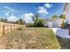 Spacious backyard with a wooden fence, a concrete patio, and lush green grass at 6502 W 96Th Ave, Westminster, CO 80021