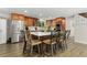Beautiful kitchen featuring stainless steel appliances, wood cabinets, and a large center island with seating at 6502 W 96Th Ave, Westminster, CO 80021