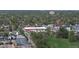 An aerial view captures a neighborhood and a mix of residential and commercial buildings at 2650 W Front View Crescent Dr # 101, Denver, CO 80211
