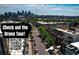 Drone shot of modern townhomes with a skyline view and street access at 2650 W Front View Crescent Dr # 101, Denver, CO 80211