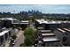 Aerial view of residential area with city skyline visible in the background at 2650 W Front View Crescent Dr # 101, Denver, CO 80211