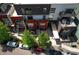 Multi-story townhome with balconies, street parking and mature trees at 2650 W Front View Crescent Dr # 101, Denver, CO 80211