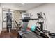 Well-equipped gym featuring a treadmill, weight machine, elliptical, and fitness ball at 2650 W Front View Crescent Dr # 101, Denver, CO 80211