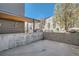 Concrete outdoor patio space with modern architectural details at 2650 W Front View Crescent Dr # 101, Denver, CO 80211