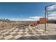 Enjoy city views from this rooftop deck featuring stylish tile flooring and outdoor seating at 2650 W Front View Crescent Dr # 101, Denver, CO 80211