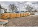A large and private backyard is fenced in, offering a versatile outdoor area for various activities at 160 W Bayaud Ave, Denver, CO 80223