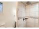 Bathroom featuring a tiled shower with niche and rain shower head at 160 W Bayaud Ave, Denver, CO 80223
