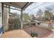 Charming front porch with brick supports and a wood floor and view of the street at 160 W Bayaud Ave, Denver, CO 80223