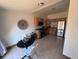 Well-lit kitchen with stainless steel appliances, a dining table, and tile flooring at 160 W Bayaud Ave, Denver, CO 80223