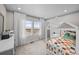 Bright bedroom with a playful design, large windows offering ample natural light at 17112 W 91St Ln, Arvada, CO 80007
